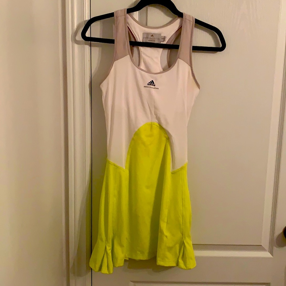 White/neon yellow tennis dress. Mesh top. US size 6-8. EUR size 36.